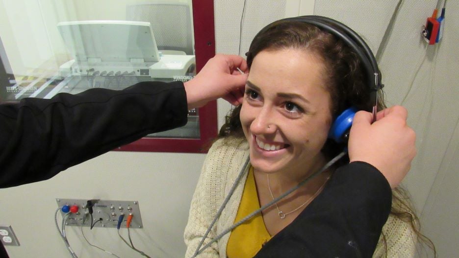 a student getting a hearing test