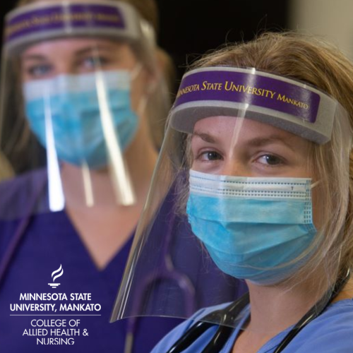 Two Minnesota State Mankato nursing students wearing face shields and masks