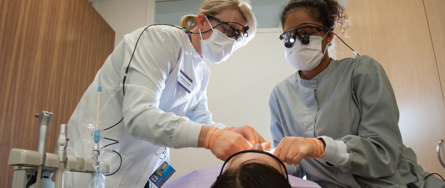 Dental Hygiene and instructor with patient
