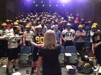 Cindra presenting to a football team