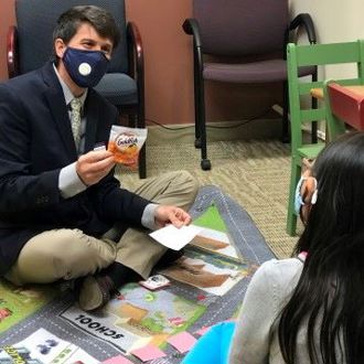 Wm. Eric Strong works with a client at The Health Commons at Pond