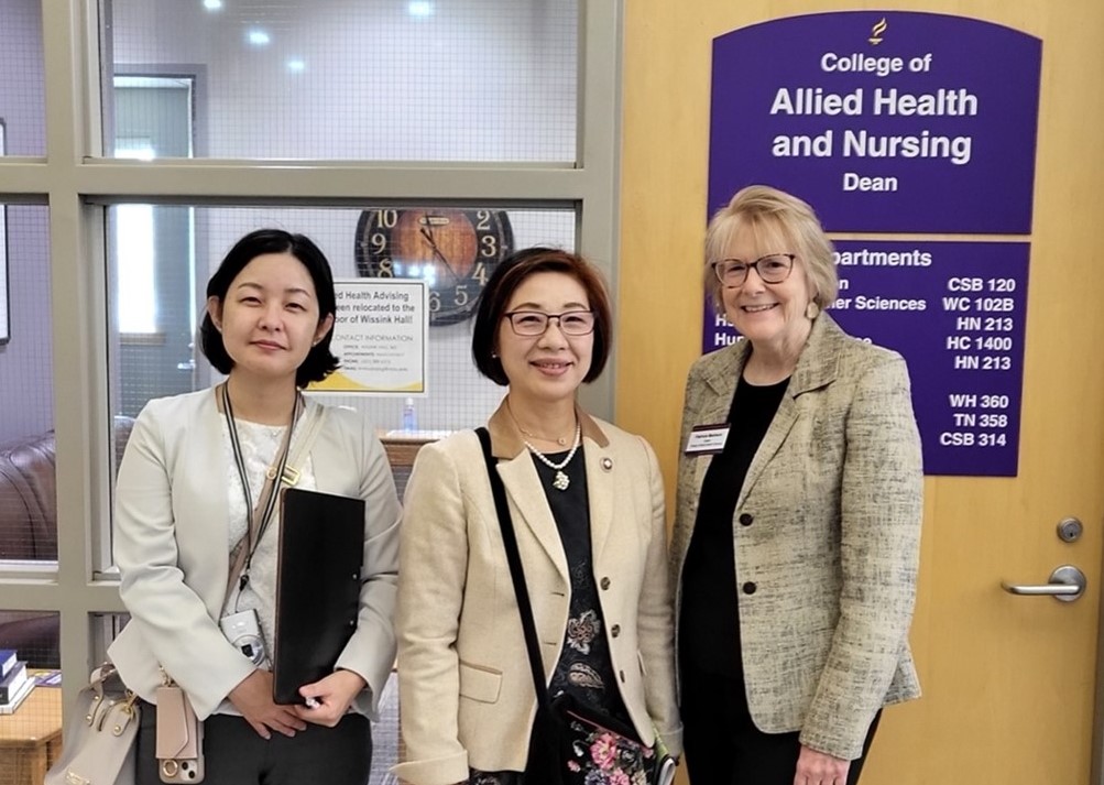 Two Kansai University delegates with dean of the College of Allied Health and Nursing. 
