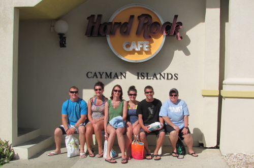 Students in front of Hard Rock sign