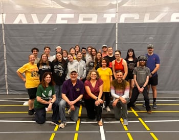 Group of students and faculty at the Annual Senior Sendoff Kickball Game