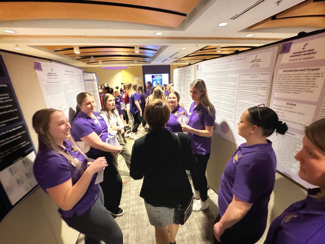 Group of nursing students presenting research