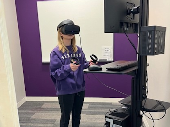 Student using virtual reality device