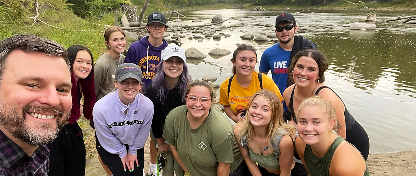 a group of people posing for a photo